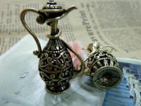 Colgante Botella Bronce REF.CM0011 Medida 20 x 28 x 48 mm 2,70 euros / Unidad